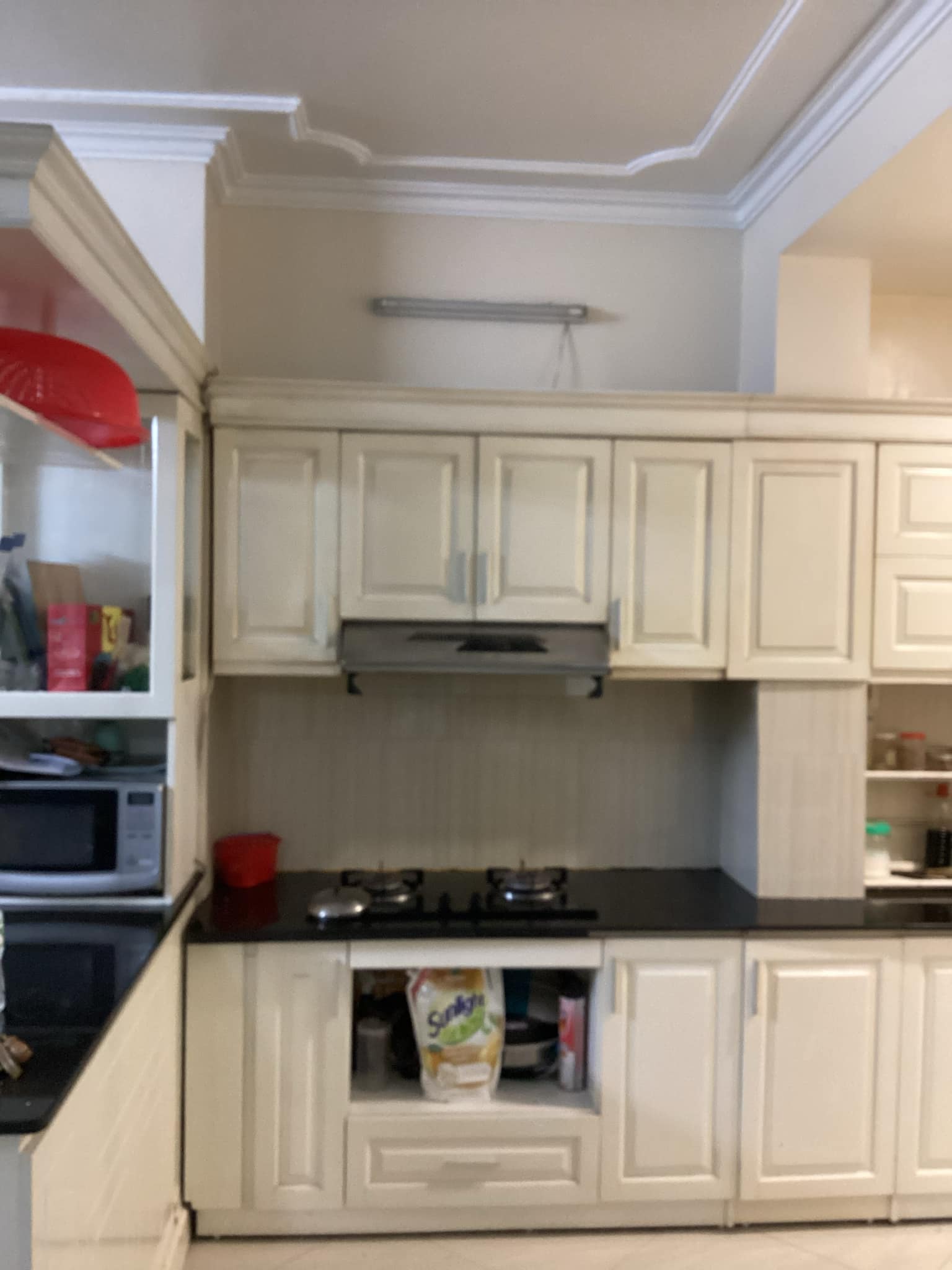 Tủ bếp inox cánh kính cường lực nhà Chị Tình - Tây Sơn